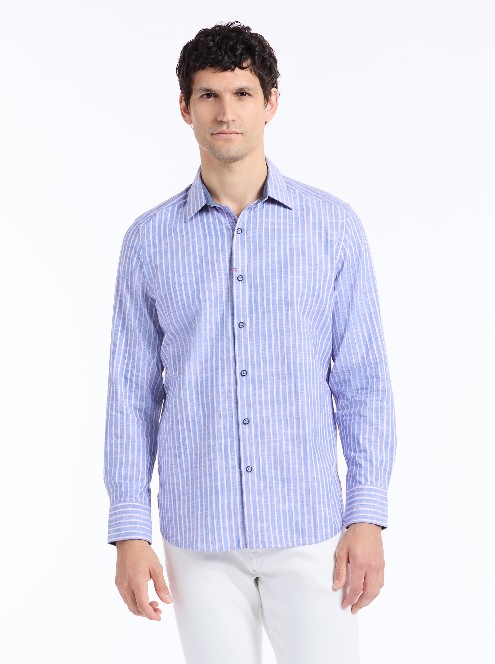 Man wearing a blue striped shirt on a white background