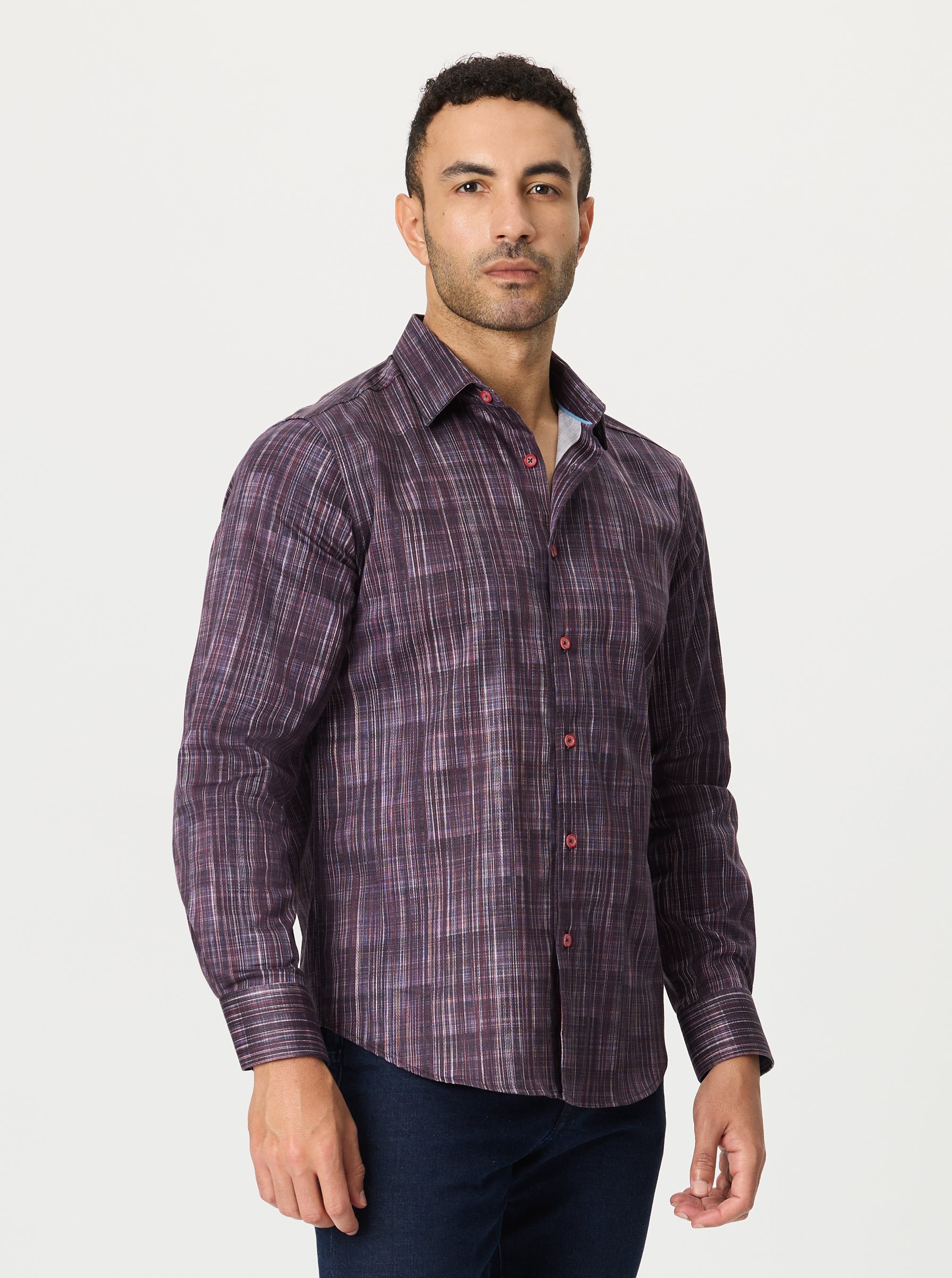 Man wearing a purple striped shirt on a white background