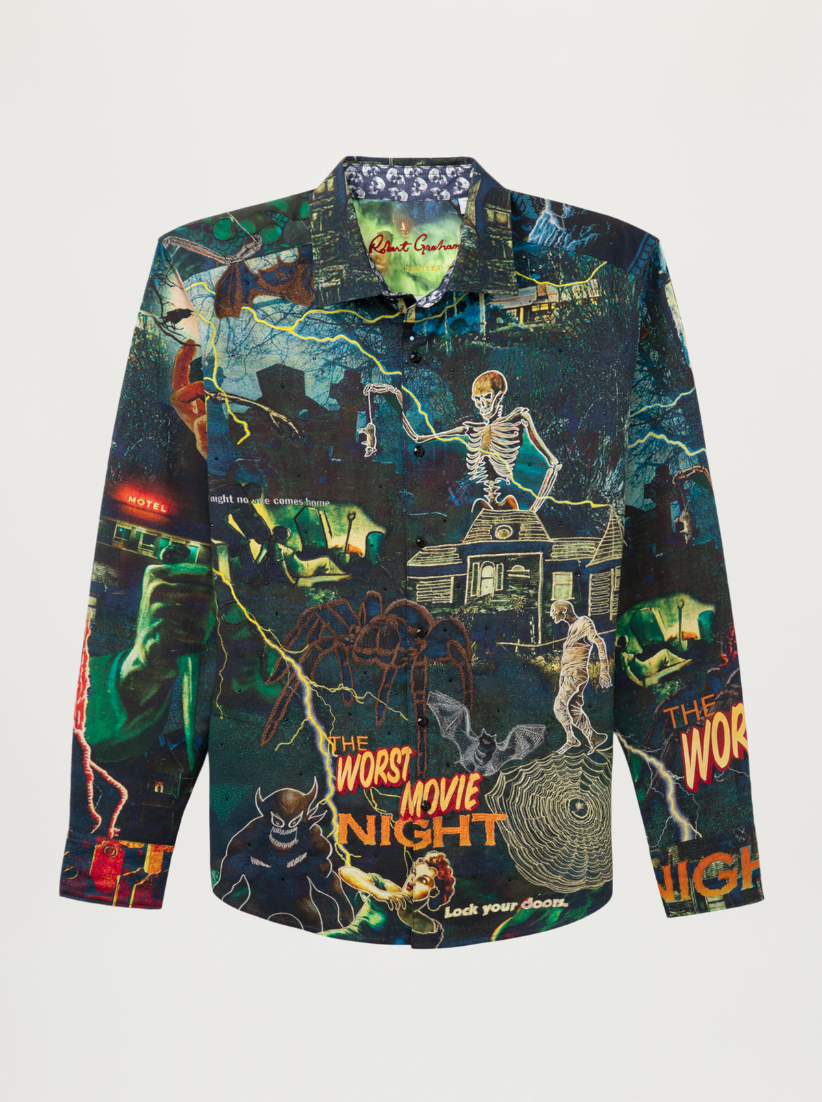 A long-sleeve button-up shirt featuring a highly detailed, colorful horror movie collage print with a skeleton, spider, haunted house, and lightning on a dark background.