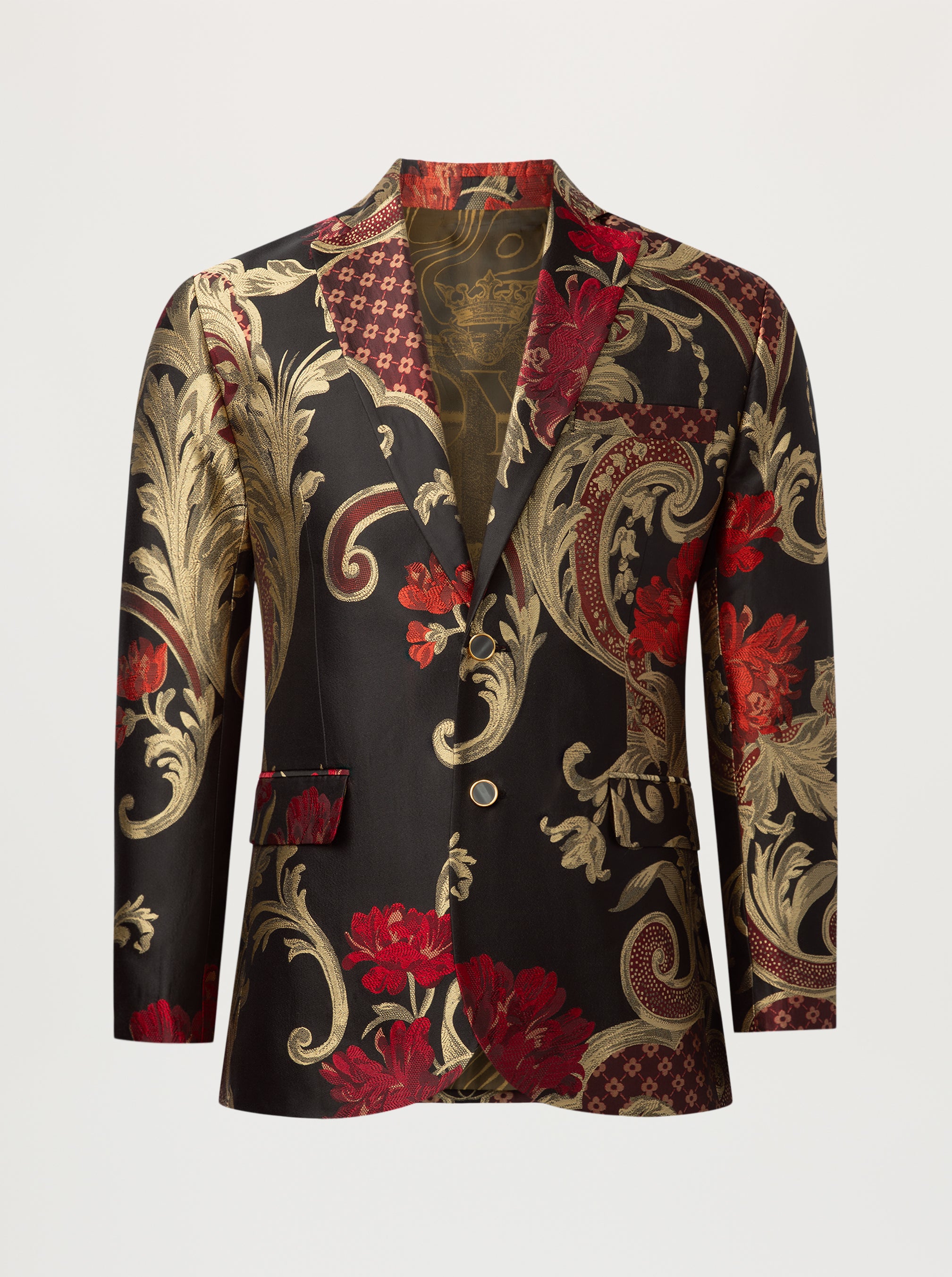 A men's single-breasted blazer with a luxurious baroque pattern in red, gold, and black, featuring a single button closure and a notched collar, shown on a neutral light gray background.