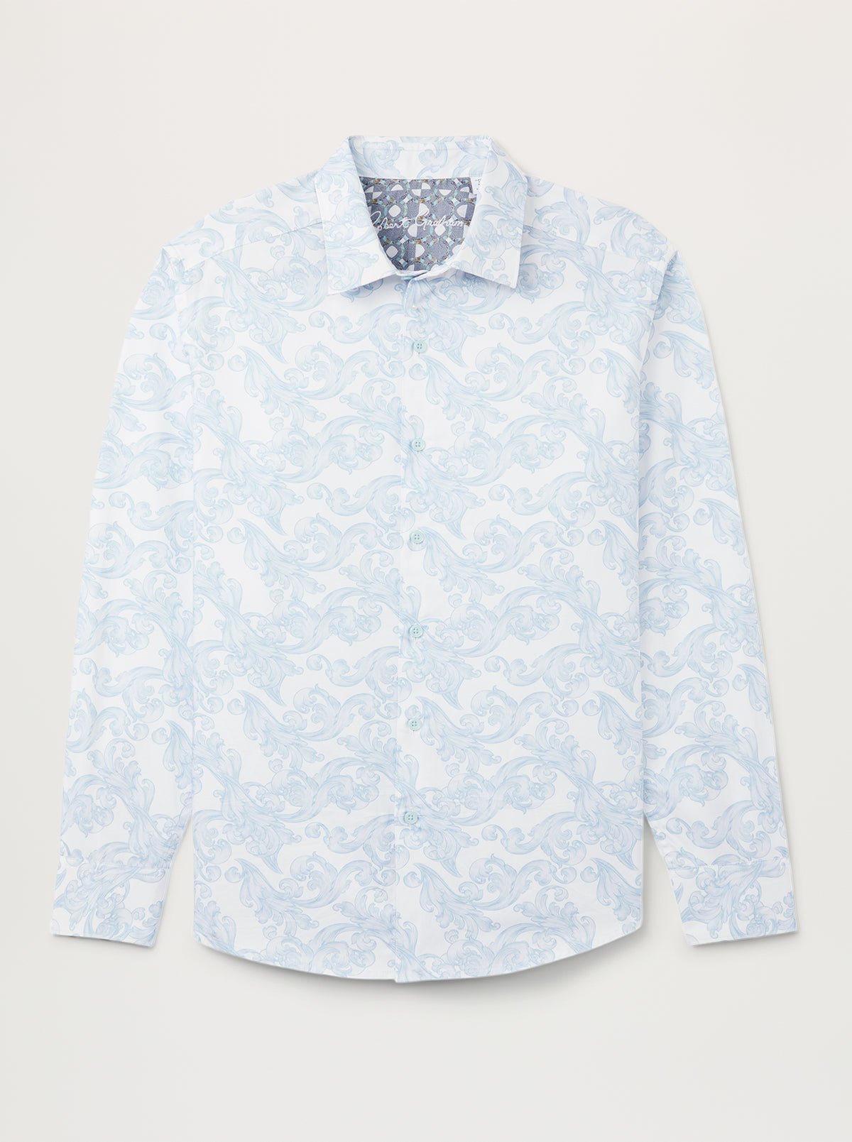 A long-sleeve button-up shirt with a light blue and white damask pattern, displayed flat against a light beige background.