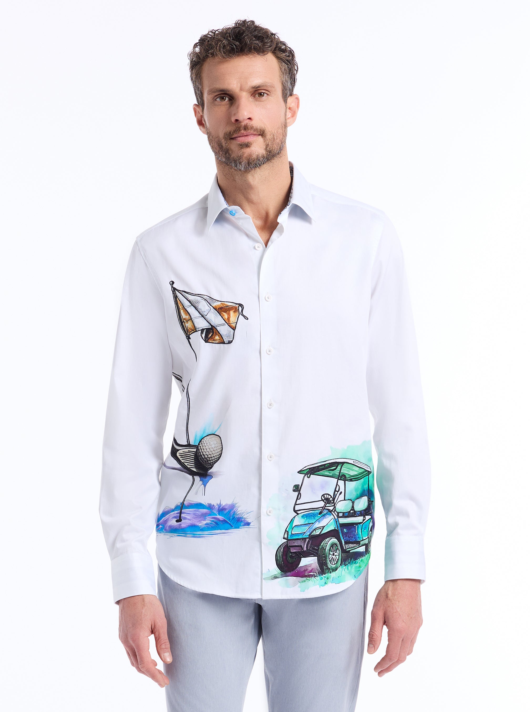 Man wearing a white shirt with colorful golf graphics on a white background