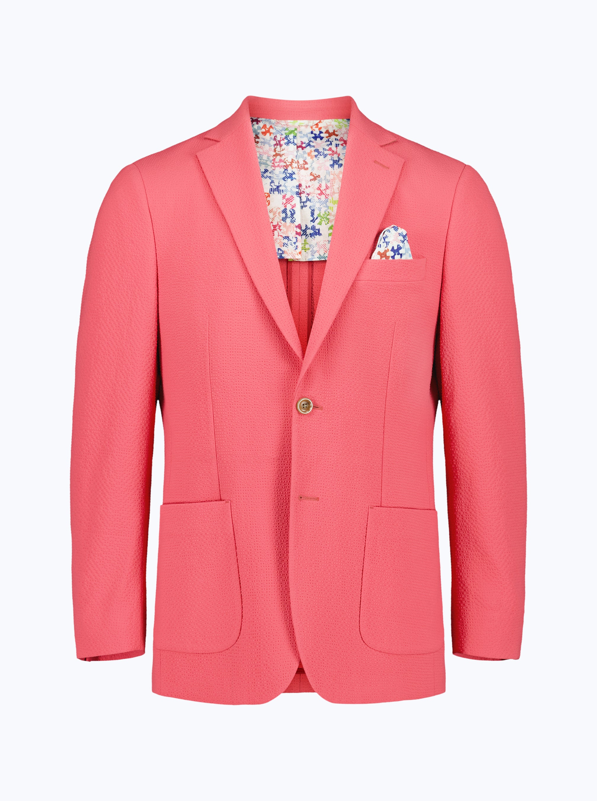 Coral blazer with patterned lining and pocket square on a white background