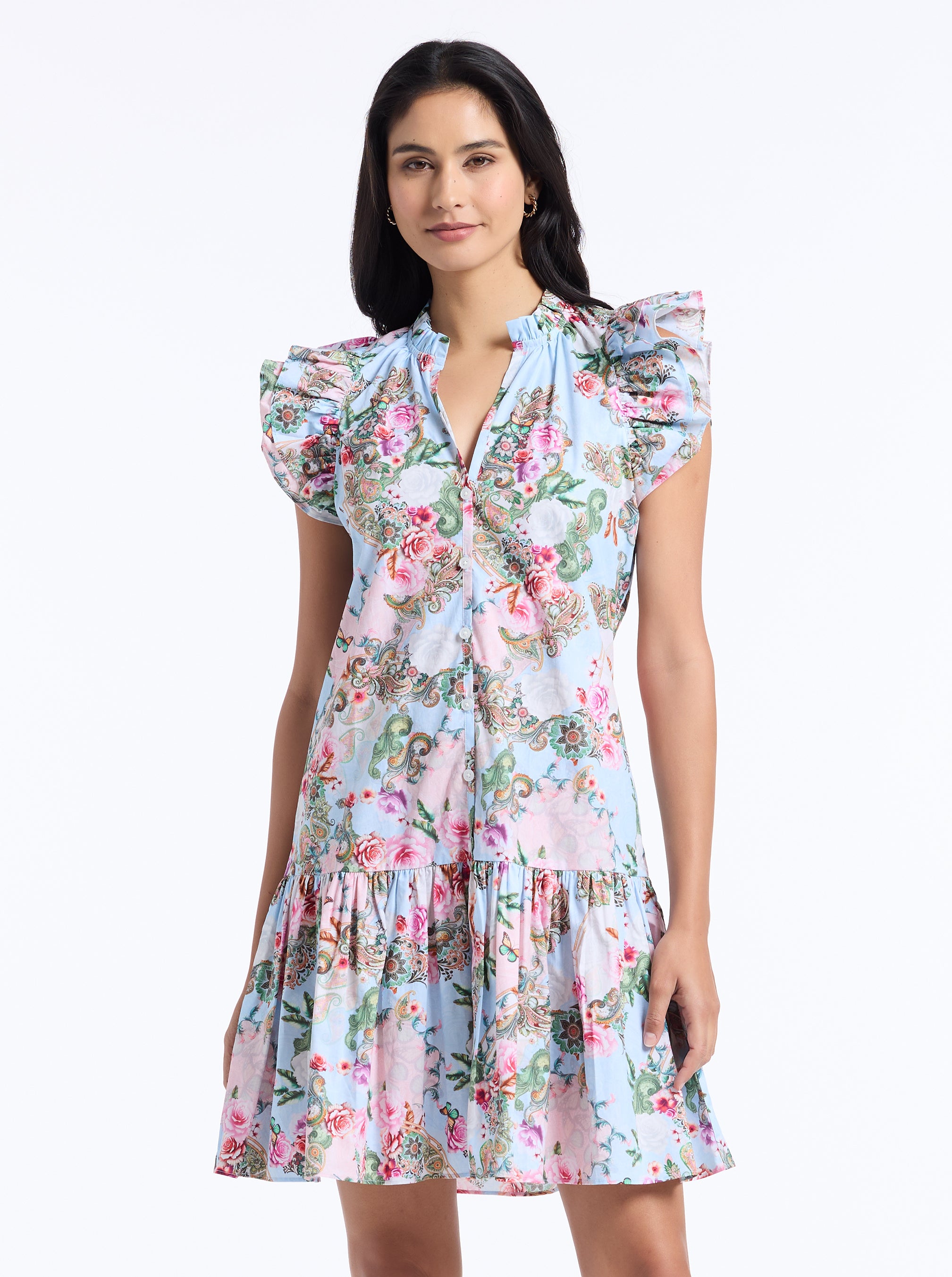 Woman wearing a floral dress on a white background