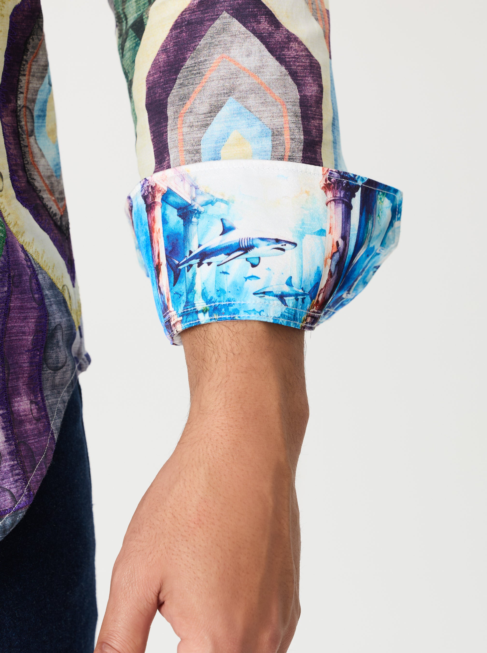 Close-up of a Shark sleeve with abstract patterns on a plain background