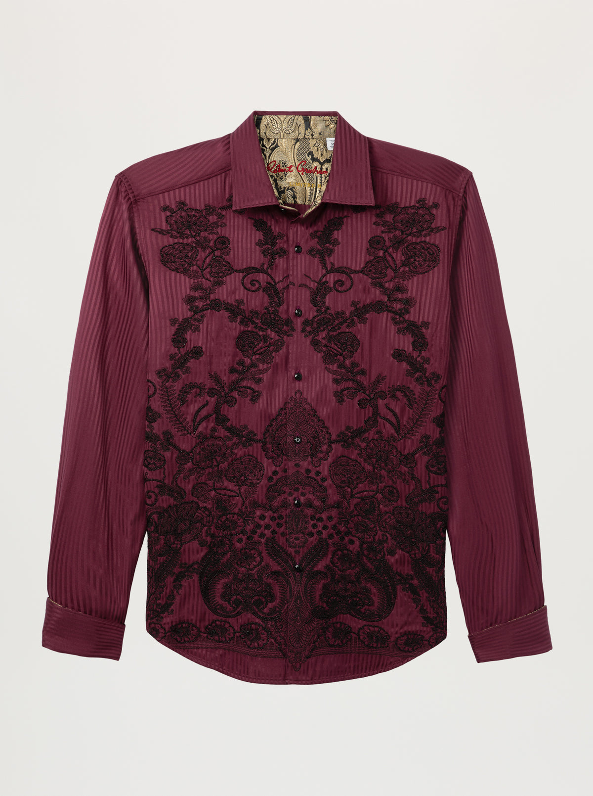 A long-sleeve button-up shirt in deep burgundy with black damask embroidery across the front, shown against a light gray background.