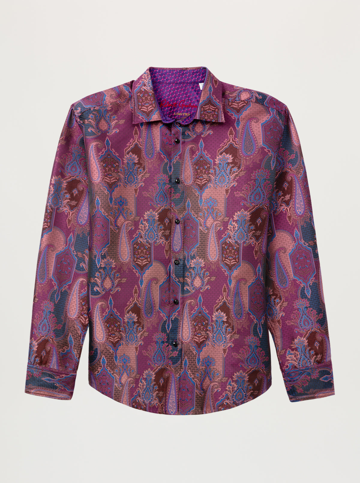 A long-sleeve button-up shirt with an intricate paisley and floral pattern in shades of purple, pink, and blue, displayed on a neutral light gray background.