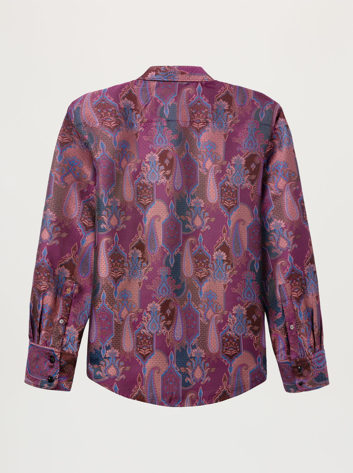 A long-sleeve button-up shirt with a dense, ornate paisley and floral pattern in shades of magenta, purple, blue, and brown, shown from the back against a light gray background.