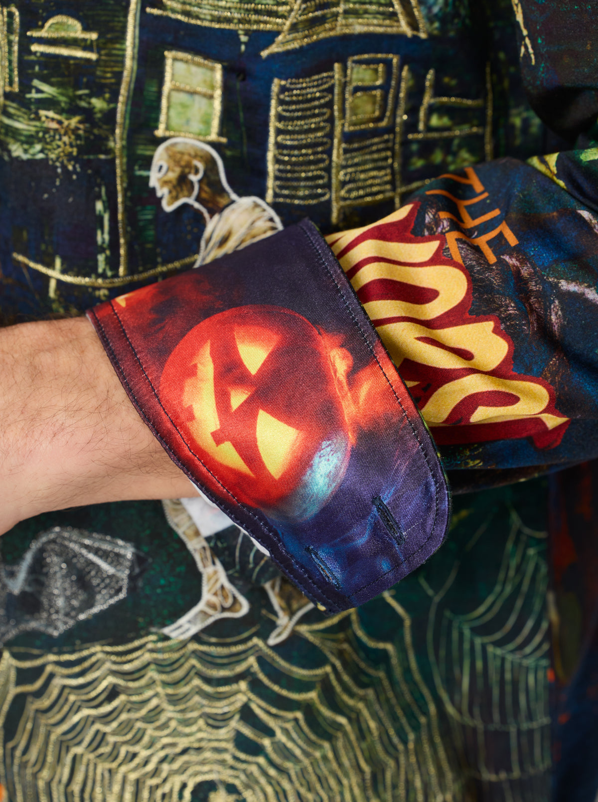 Halloween-themed cuff with jack-o'-lantern design 