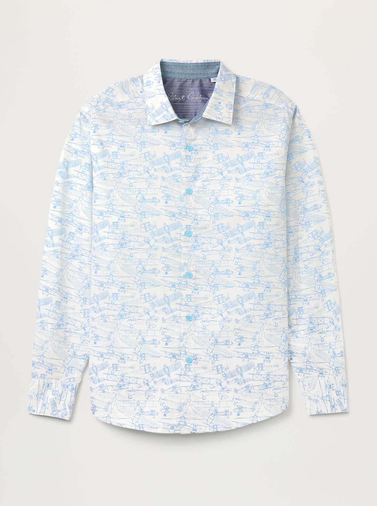 Long sleeve button up shirt with light blue airplane sketch graphic allover 