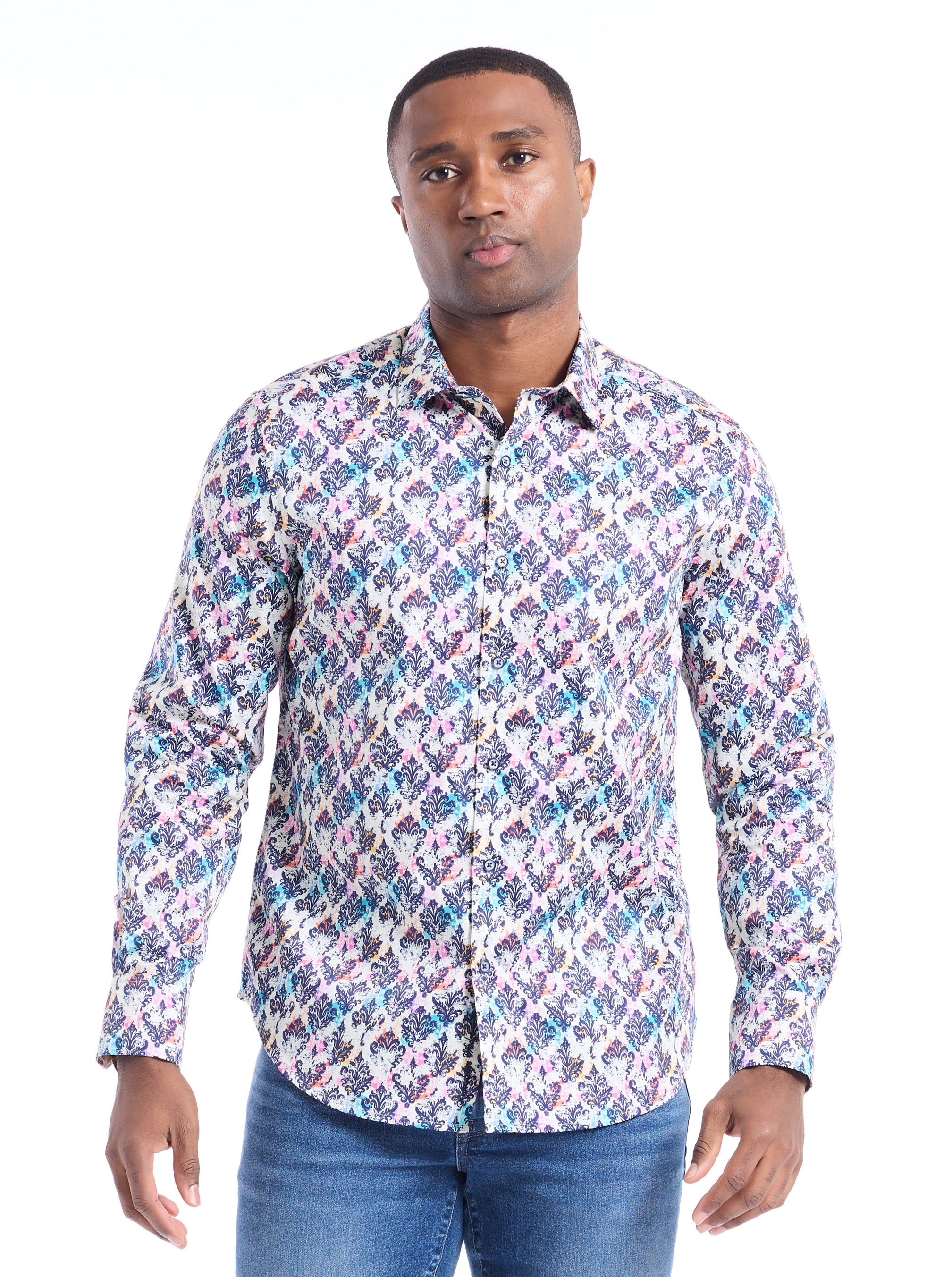 Man wearing a patterned shirt on a white background