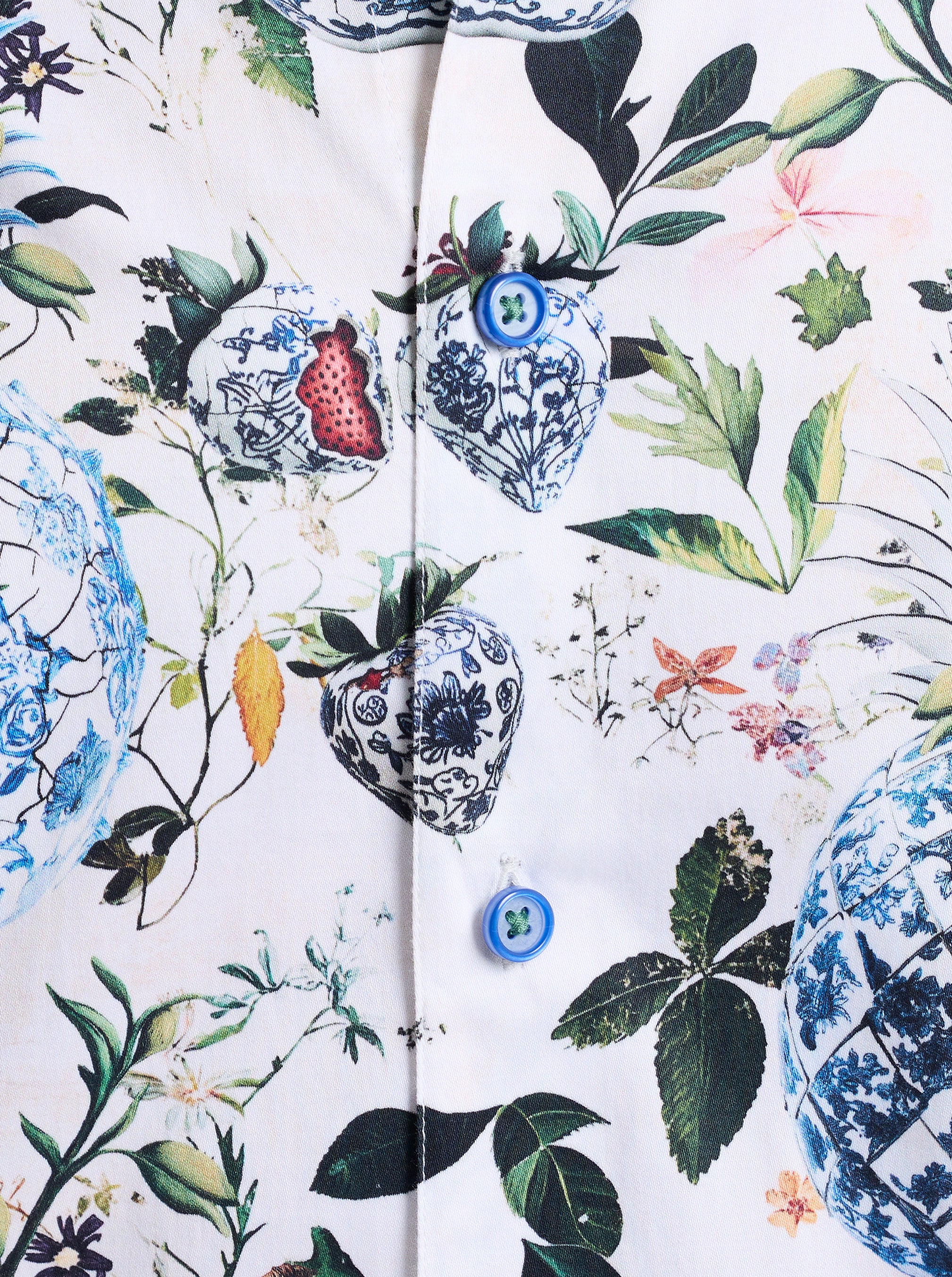 Close-up of a fabric with floral and ceramic design pattern