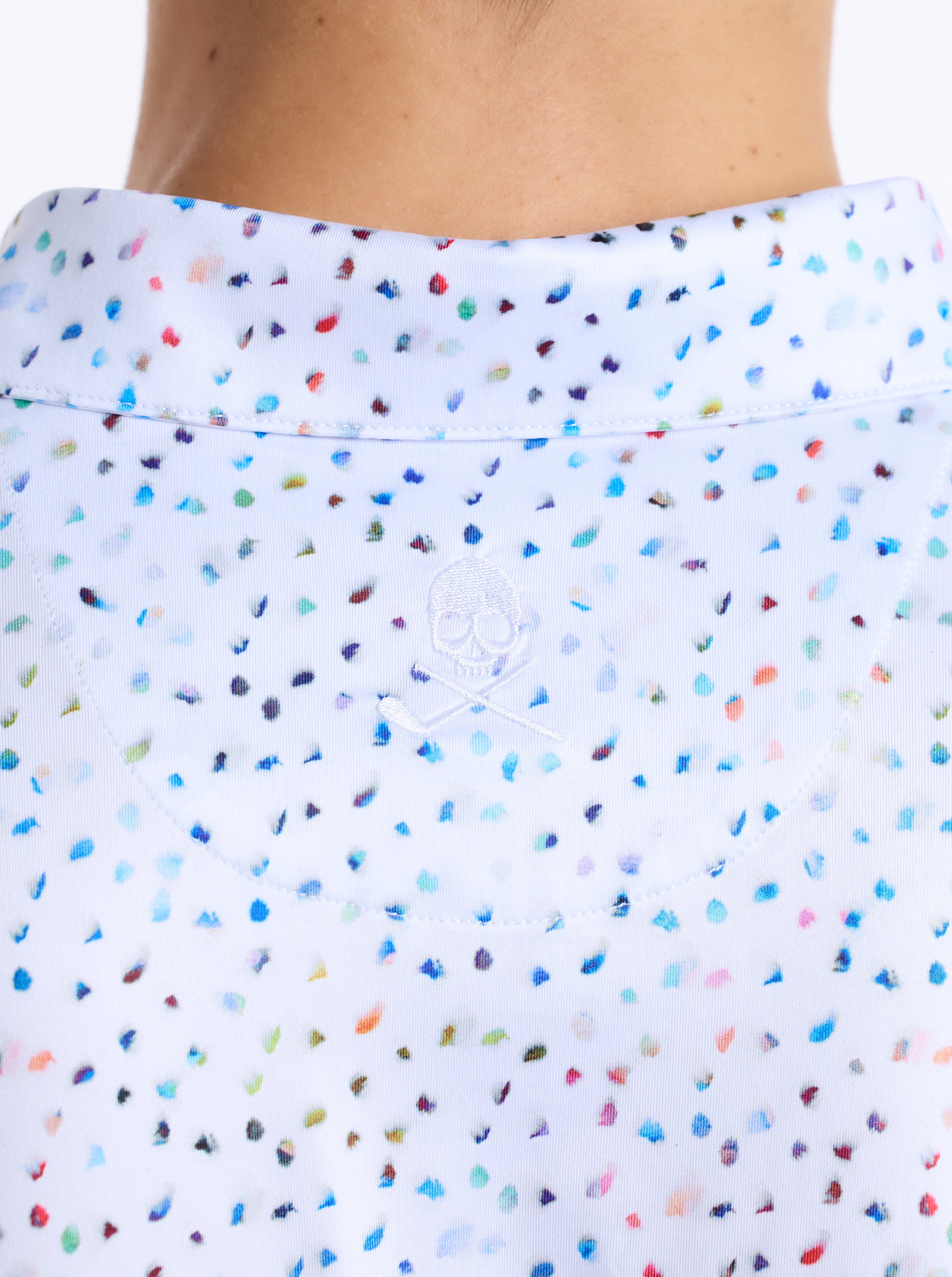 Close-up of a colorful speckled fabric on a white background