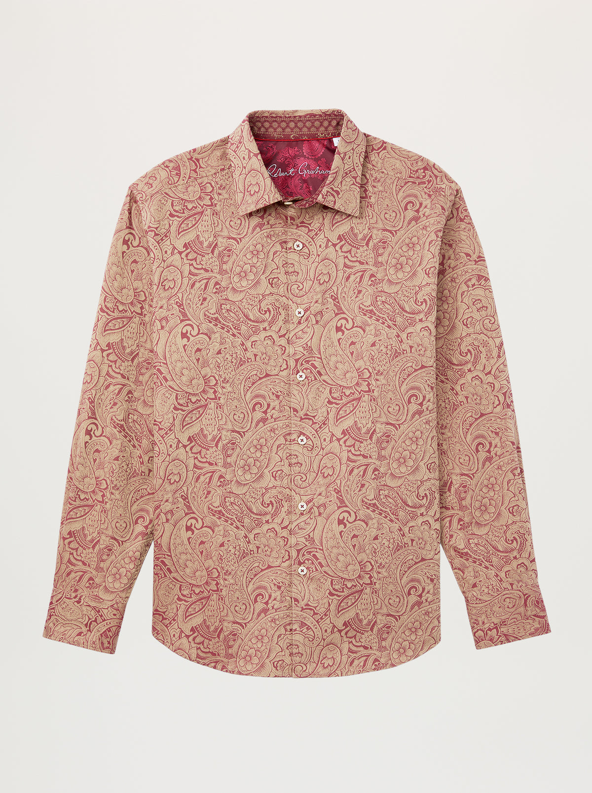 A long-sleeve button-up shirt with a beige base and a dusty rose paisley pattern, displayed flat against a light gray background.