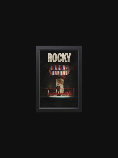 John describes an artwork depicting Rocky (the "Italian Stallion") draped in an American flag, meant to symbolize hope and possibility. It frames Rocky's rise from underdog to champion as an embodiment of the American Dream.